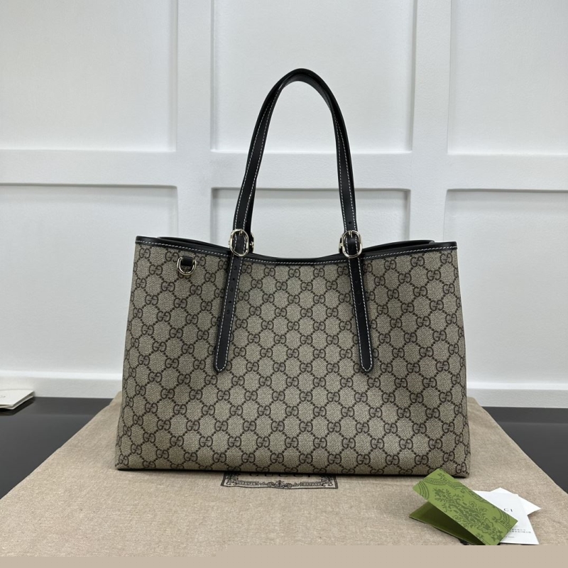G*u*i shopping bags